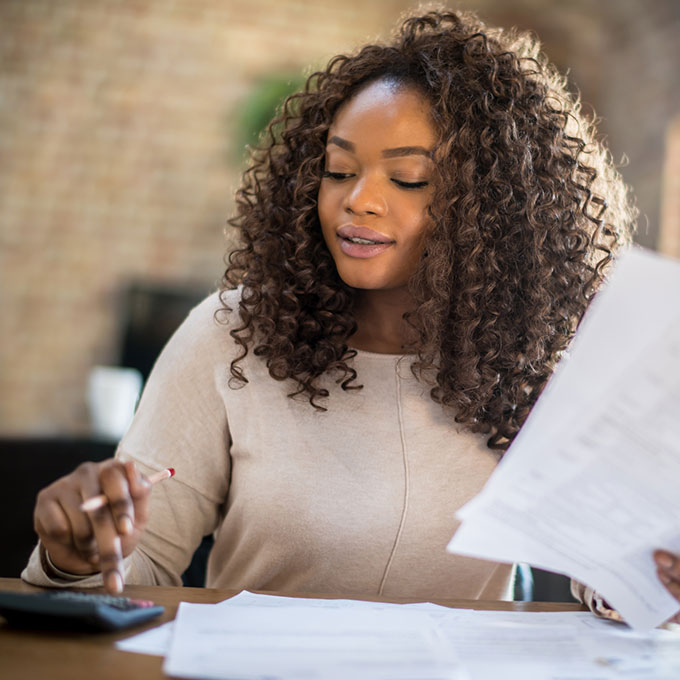 woman using a calculator